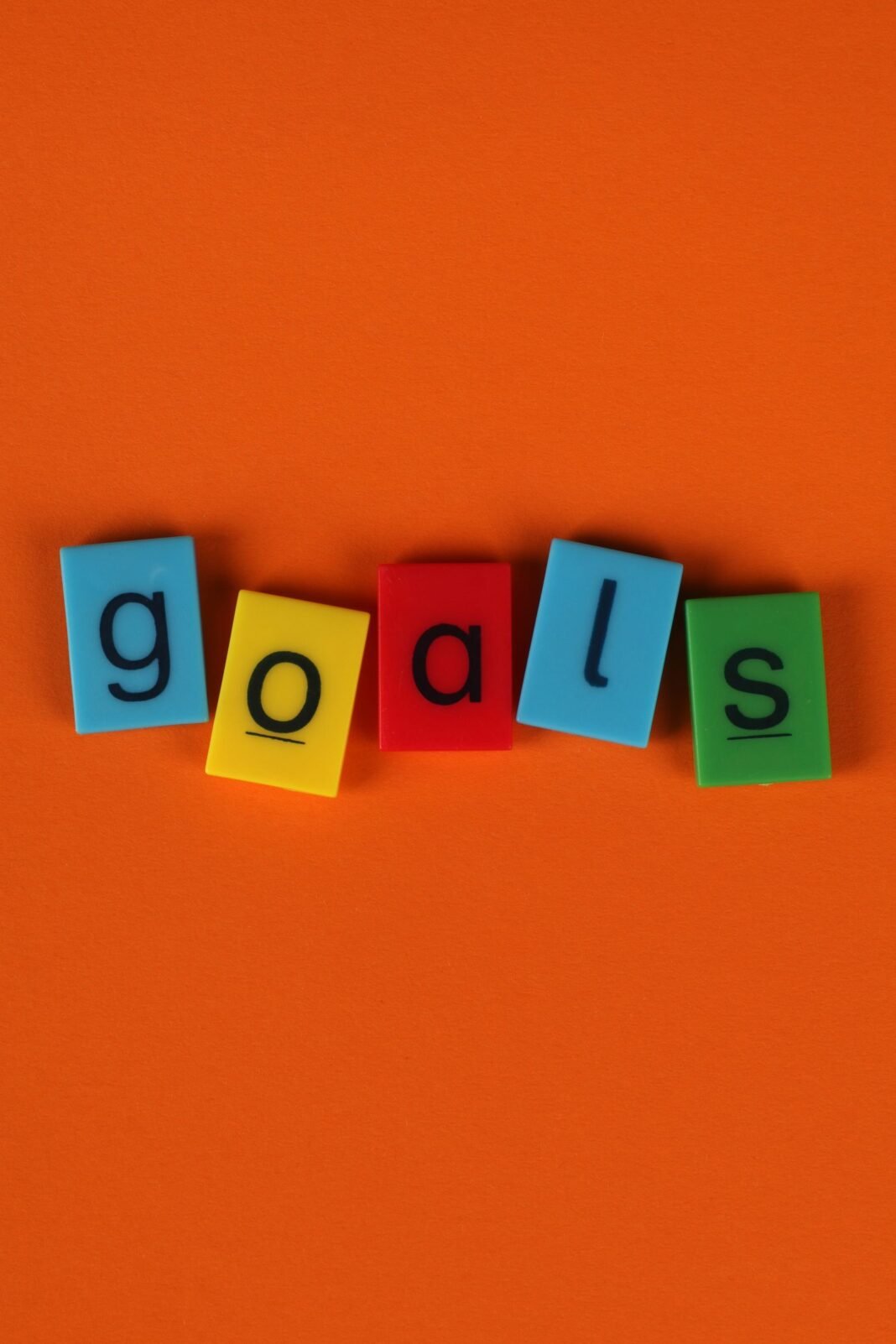 Set Goals That Actually Get Done: 9 Steps for Nigerians Colourful letter blocks spelling the word goals