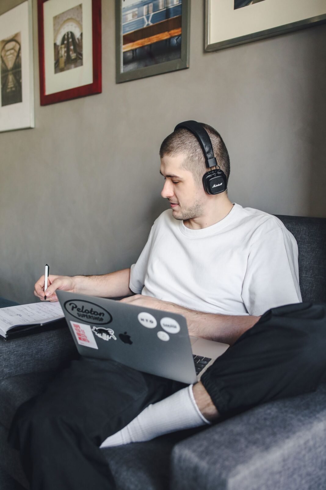Deep Work in Nigeria: 8 Rules to Guard Your Focus A person working with headphones on, in a period of deep, focused work