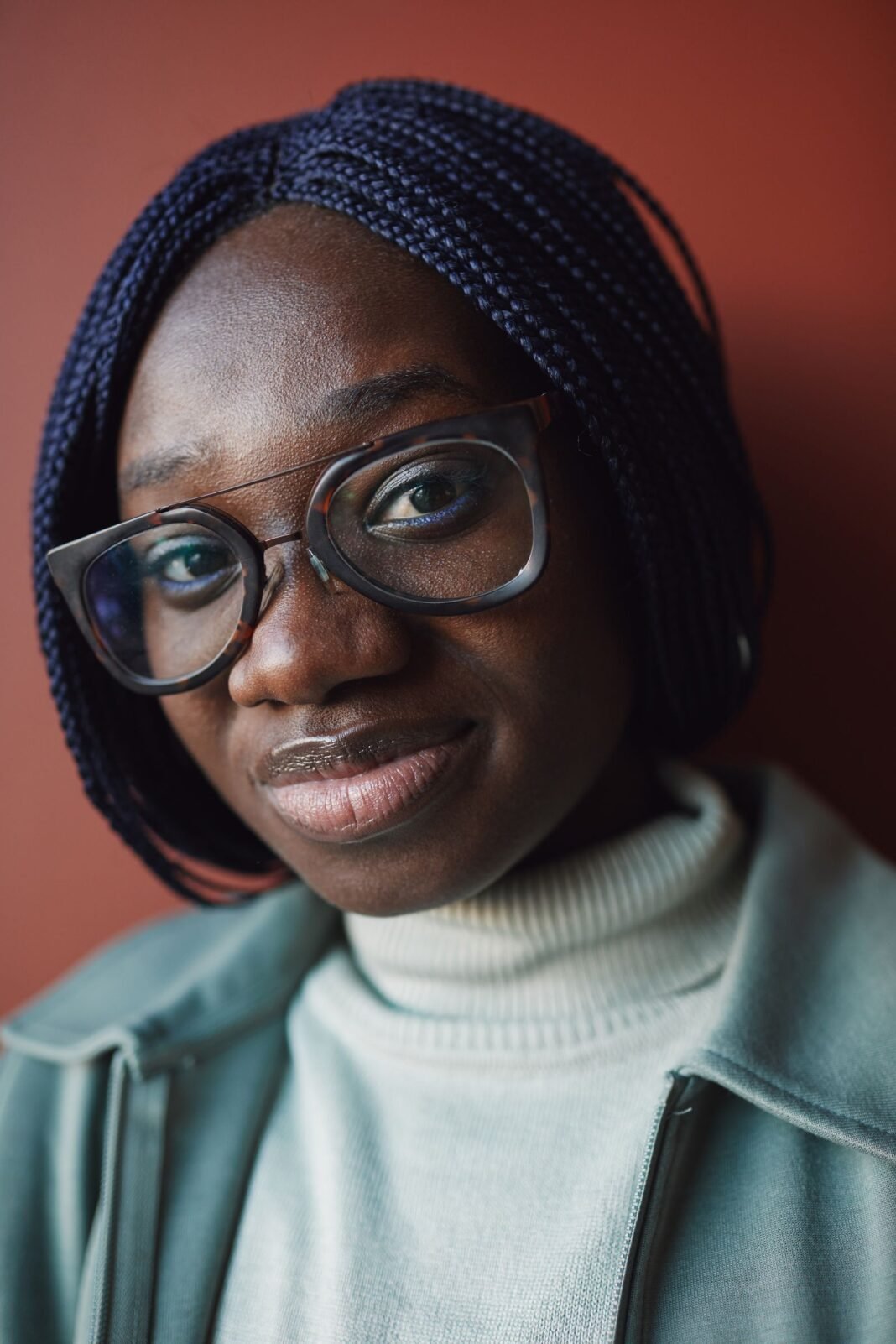 Building Real Confidence as a Nigerian: 8 Practical Ways A woman smiling confidently to camera