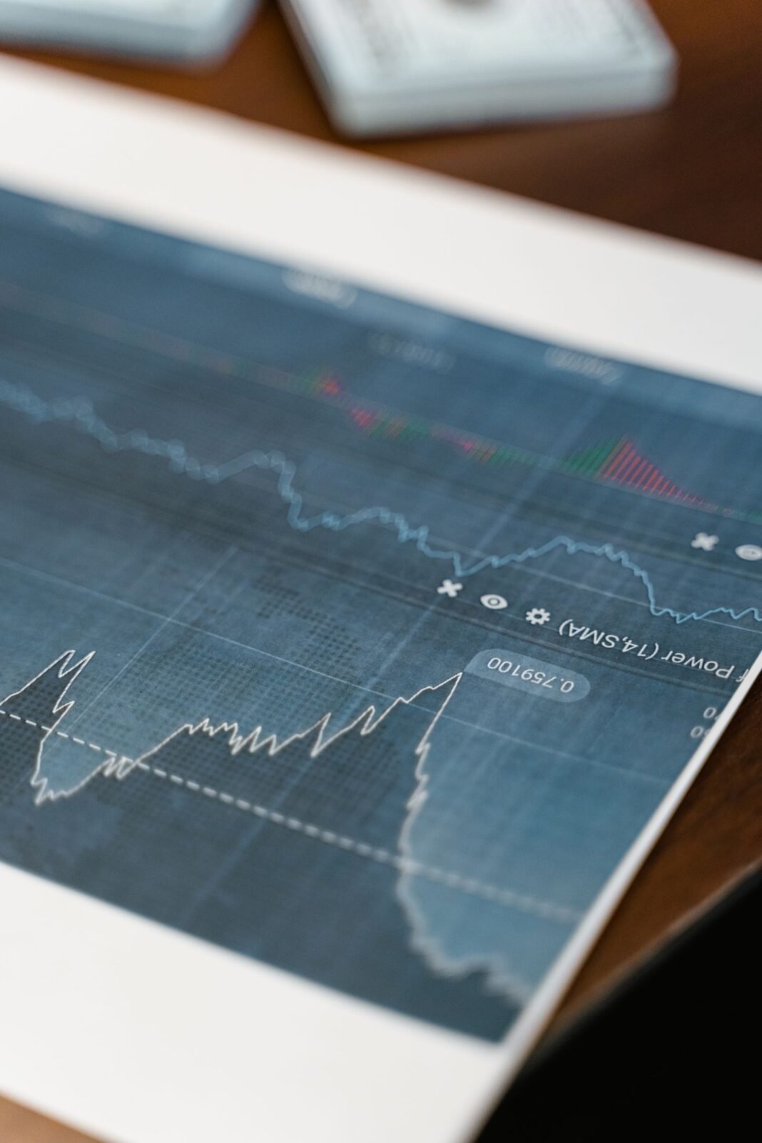 Investing for Beginners in Nigeria: 8 Rules Before You Start A screen showing financial market charts and price movements