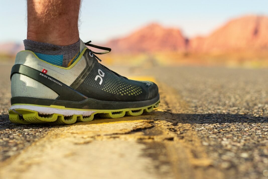 Close-up of running shoes on a trail, representing daily self-discipline