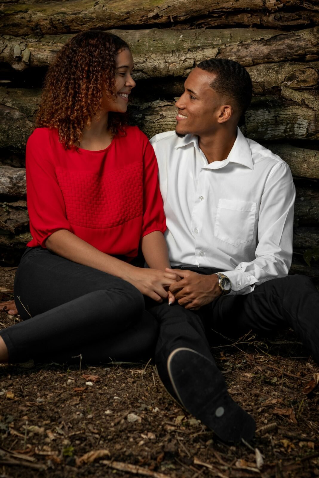 How to Communicate Better in Relationships: 8 Practical Habits Couple sitting side by side holding hands during a conversation
